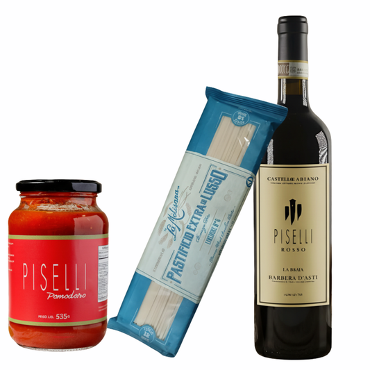 Foto do Kit Excelência à Mesa, mostrando a garrafa de Vinho Piselli Rosso DOCG, o pacote de Linguine La Molisana Extra Di Lusso e o pote de Molho Piselli Artesanal.